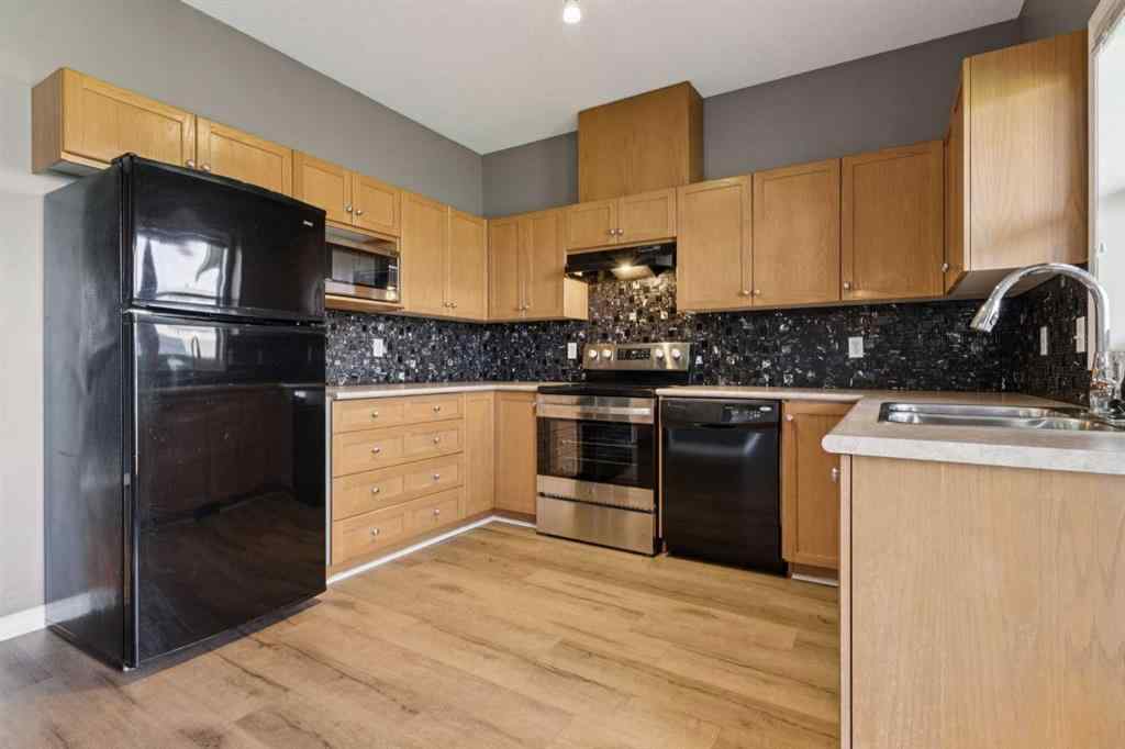MLS® A2254513 - Unit #104 2001 Luxstone Boulevard SW in Luxstone Airdrie, Residential