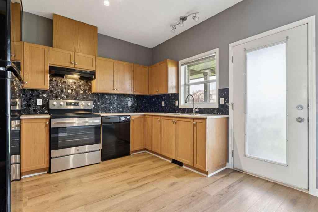 MLS® A2254513 - Unit #104 2001 Luxstone Boulevard SW in Luxstone Airdrie, Residential