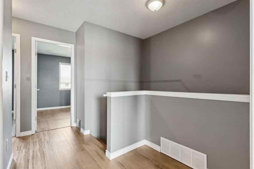 MLS® A2254513 - Unit #104 2001 Luxstone Boulevard SW in Luxstone Airdrie, Residential