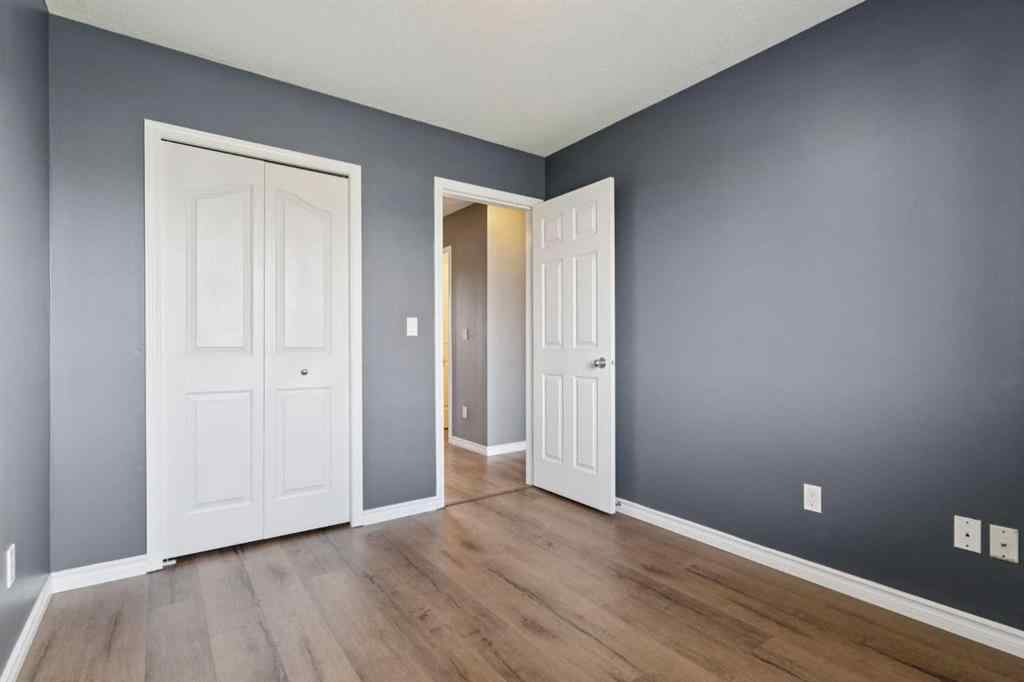 MLS® A2254513 - Unit #104 2001 Luxstone Boulevard SW in Luxstone Airdrie, Residential