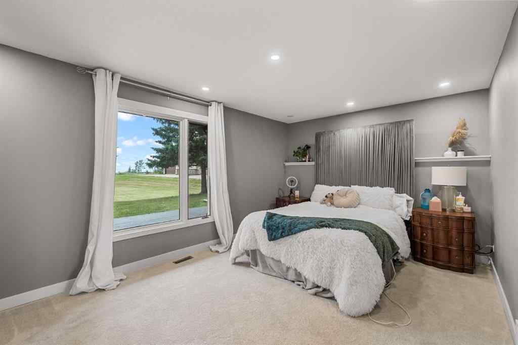 MLS® A2254515 - 65 Woodland Lane  in Bearspaw_Calg Rural Rocky View County, Residential