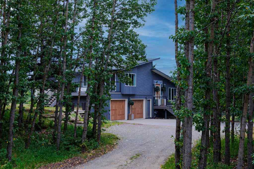 MLS® A2254515 - 65 Woodland Lane  in Bearspaw_Calg Rural Rocky View County, Residential