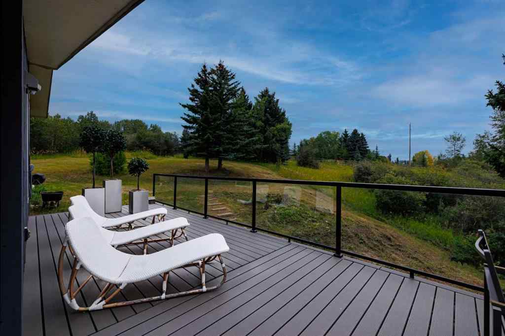 MLS® A2254515 - 65 Woodland Lane  in Bearspaw_Calg Rural Rocky View County, Residential