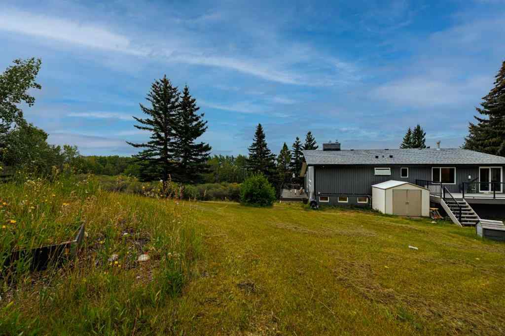 MLS® A2254515 - 65 Woodland Lane  in Bearspaw_Calg Rural Rocky View County, Residential