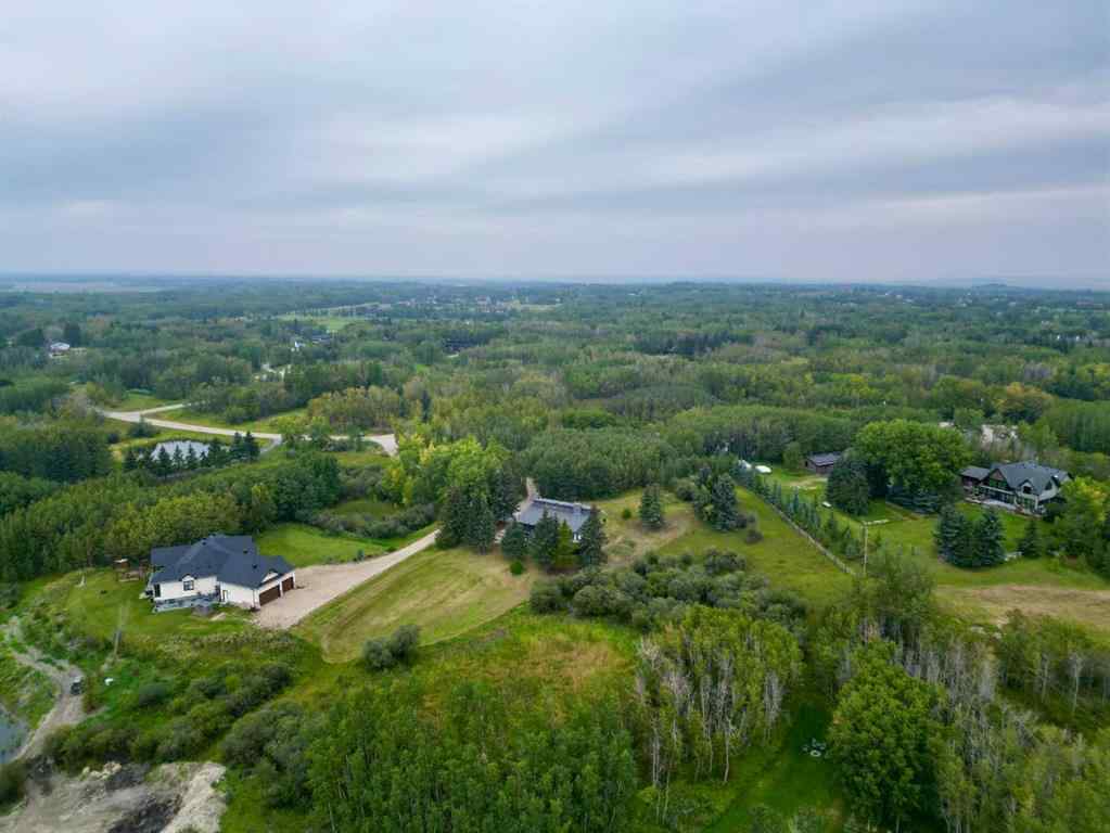 MLS® A2254515 - 65 Woodland Lane  in Bearspaw_Calg Rural Rocky View County, Residential