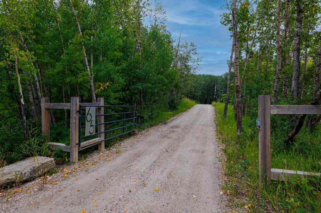 MLS® A2254515 - 65 Woodland Lane  in Bearspaw_Calg Rural Rocky View County, Residential