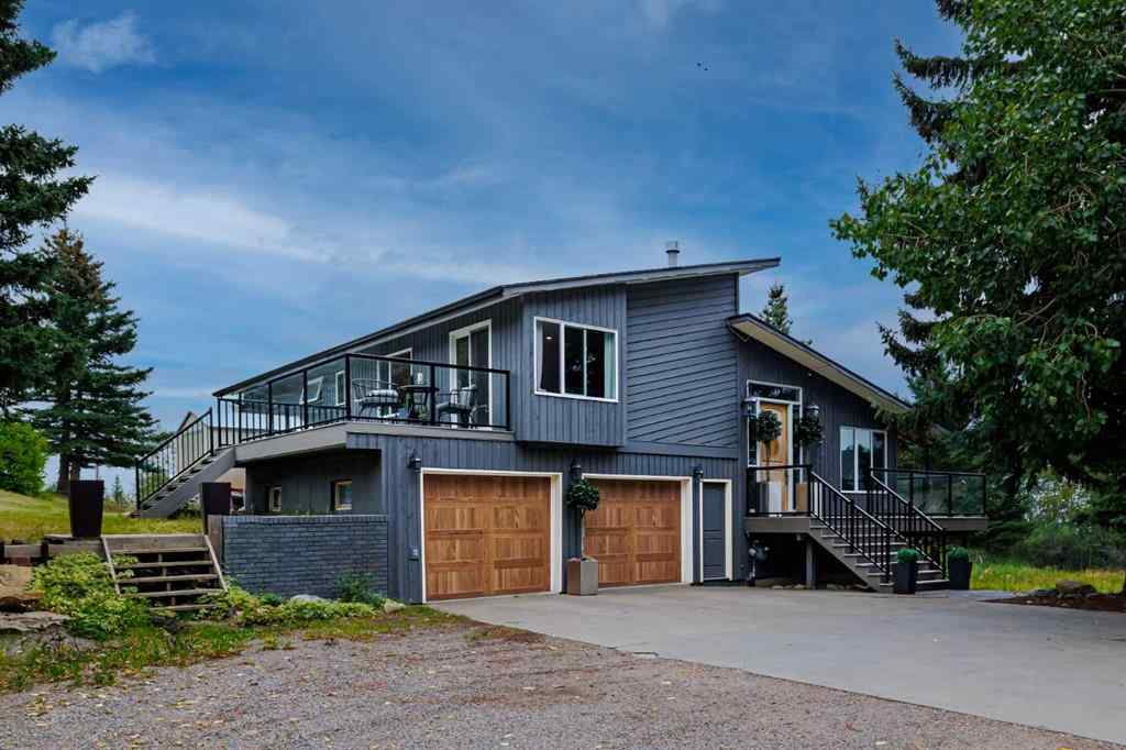 MLS® A2254515 - 65 Woodland Lane  in Bearspaw_Calg Rural Rocky View County, Residential