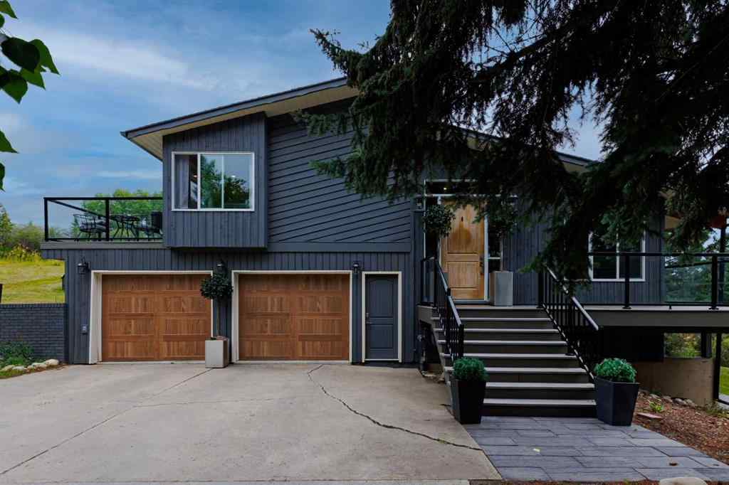 MLS® A2254515 - 65 Woodland Lane  in Bearspaw_Calg Rural Rocky View County, Residential