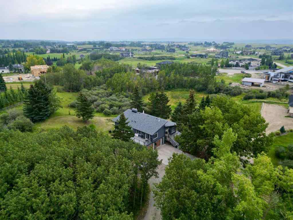 MLS® A2254515 - 65 Woodland Lane  in Bearspaw_Calg Rural Rocky View County, Residential