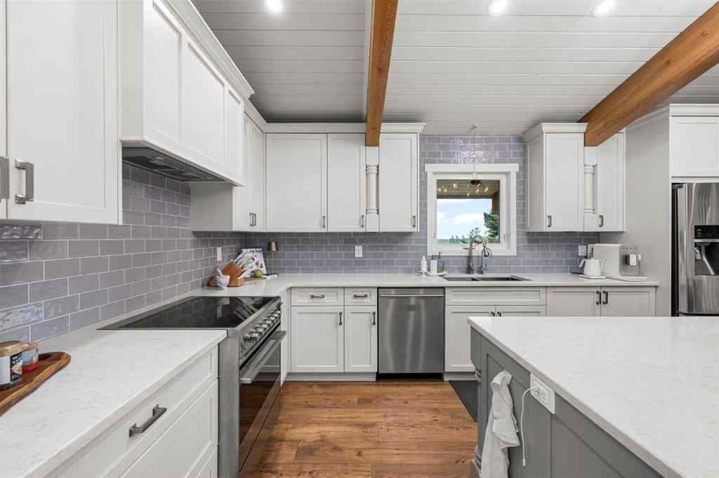 MLS® A2254515 - 65 Woodland Lane  in Bearspaw_Calg Rural Rocky View County, Residential