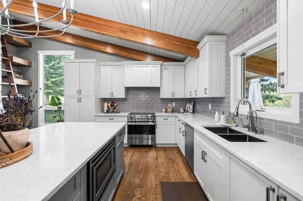 MLS® A2254515 - 65 Woodland Lane  in Bearspaw_Calg Rural Rocky View County, Residential