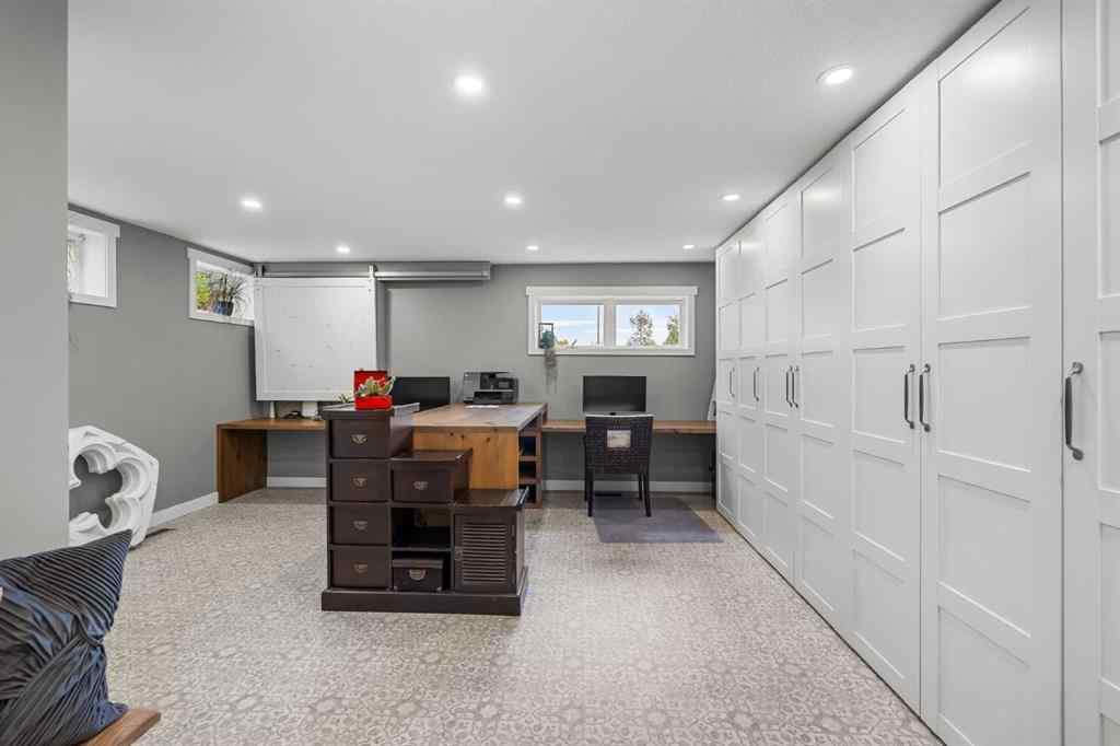 MLS® A2254515 - 65 Woodland Lane  in Bearspaw_Calg Rural Rocky View County, Residential