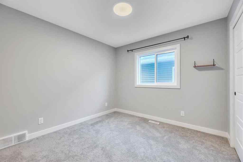 MLS® A2254517 - 277 Ambleside Avenue NW in Moraine Calgary, Residential