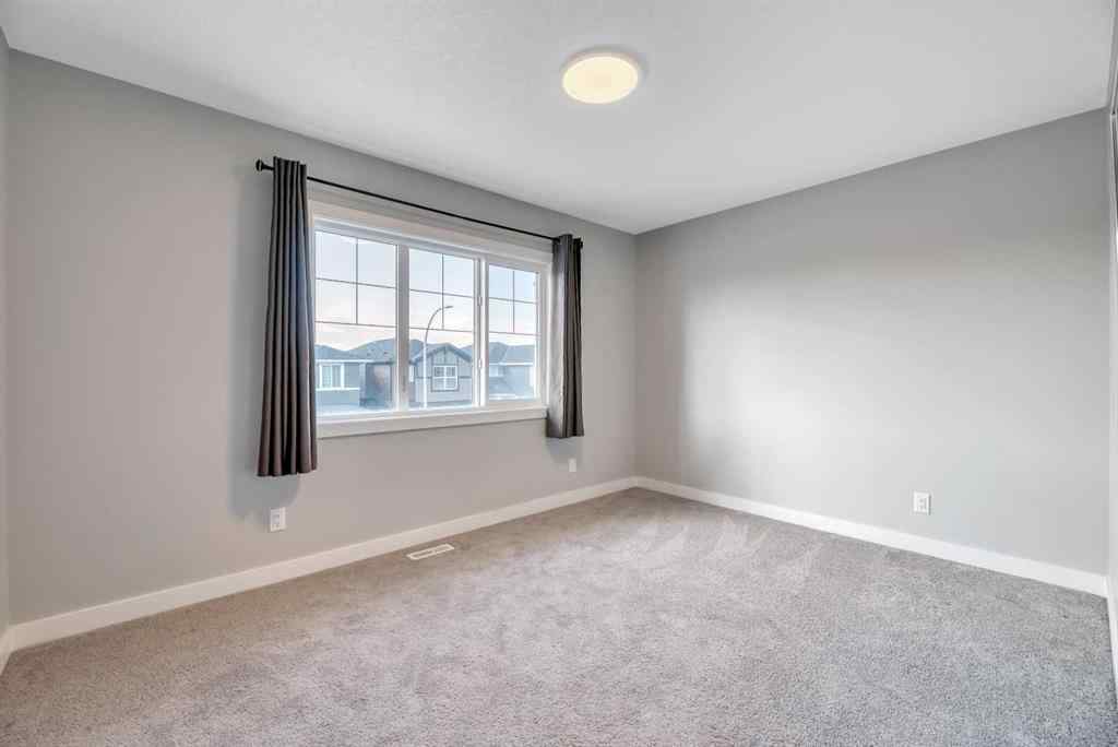 MLS® A2254517 - 277 Ambleside Avenue NW in Moraine Calgary, Residential