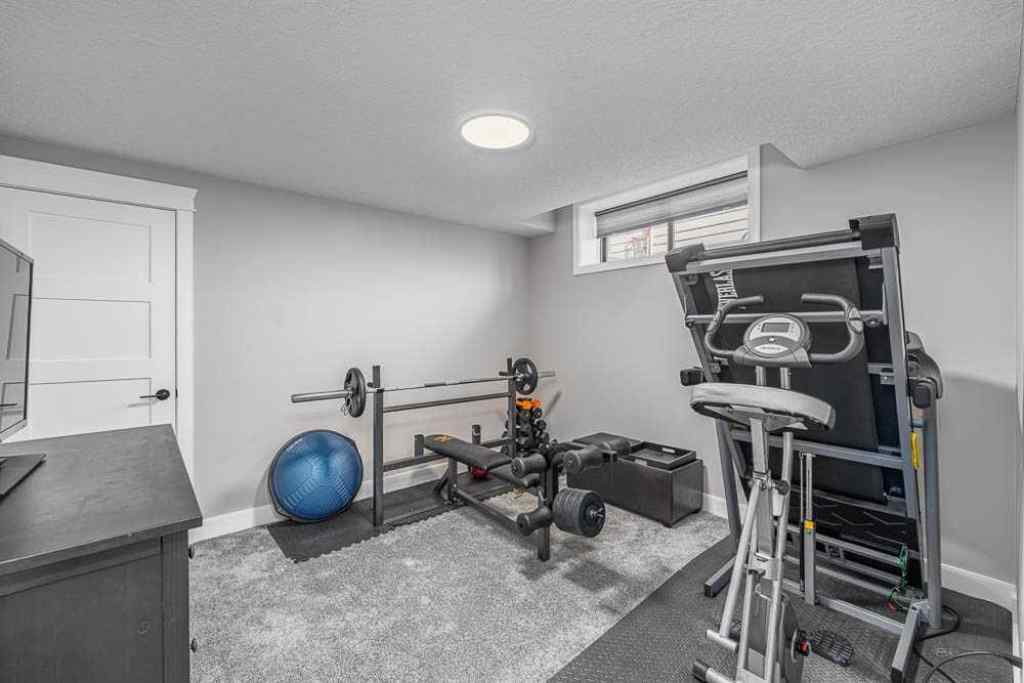 MLS® A2254533 - 1485 Coopers Landing SW in Coopers Crossing Airdrie, Residential