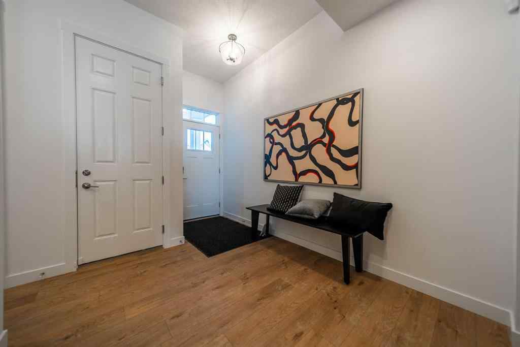 MLS® A2254542 - 203 Lucas Common NW in Livingston Calgary, Residential