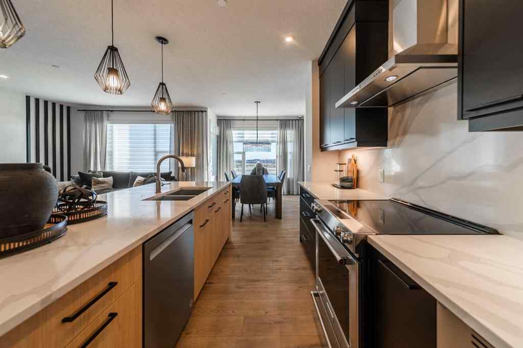 MLS® A2254542 - 203 Lucas Common NW in Livingston Calgary, Residential