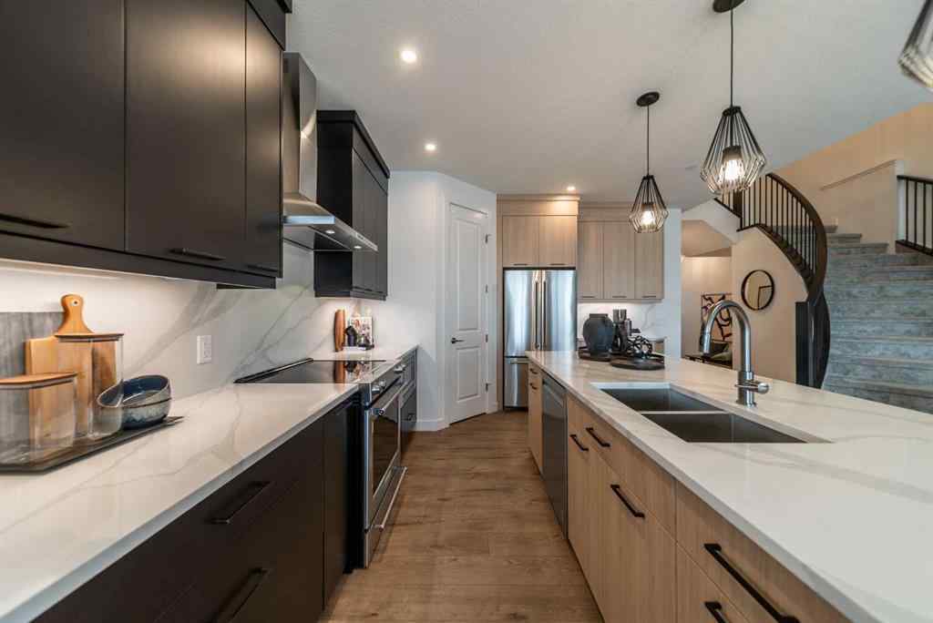 MLS® A2254542 - 203 Lucas Common NW in Livingston Calgary, Residential