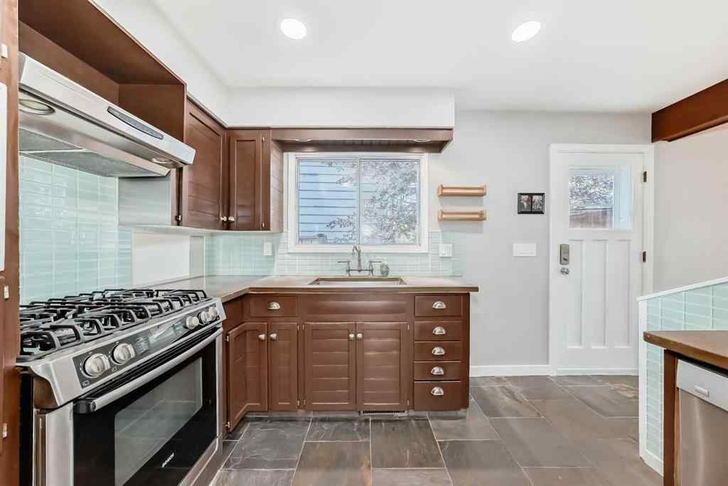 MLS® A2254575 - 51 Holden Road SW in Haysboro Calgary, Residential