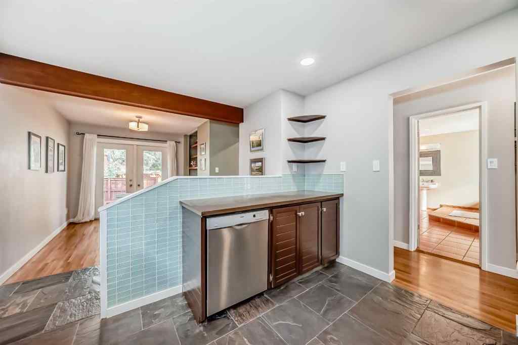 MLS® A2254575 - 51 Holden Road SW in Haysboro Calgary, Residential