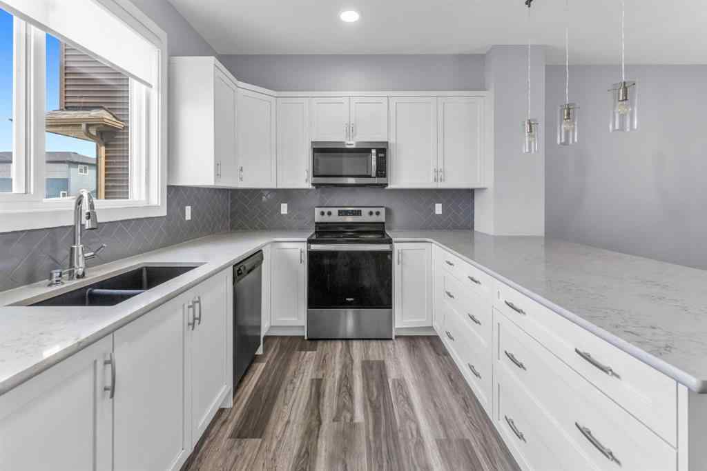 MLS® A2254585 - 310 Savanna Terrace NE in Saddle Ridge Calgary, Residential