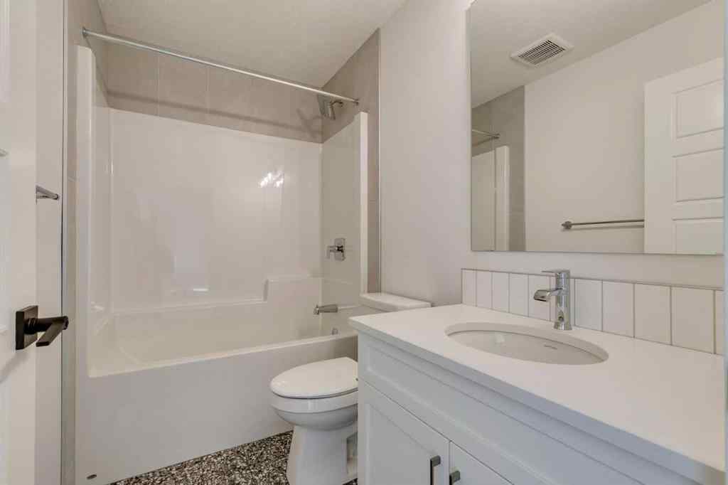 MLS® A2254589 - 104 Amblefield Grove NW in Moraine Calgary, Residential