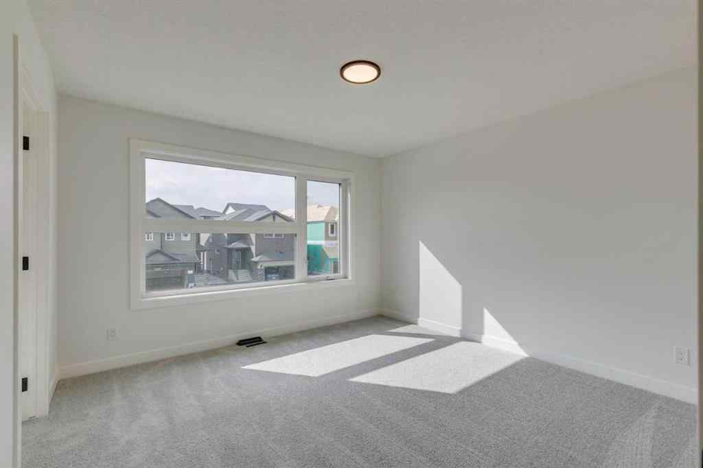 MLS® A2254589 - 104 Amblefield Grove NW in Moraine Calgary, Residential