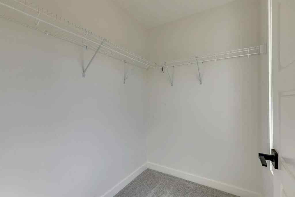 MLS® A2254589 - 104 Amblefield Grove NW in Moraine Calgary, Residential