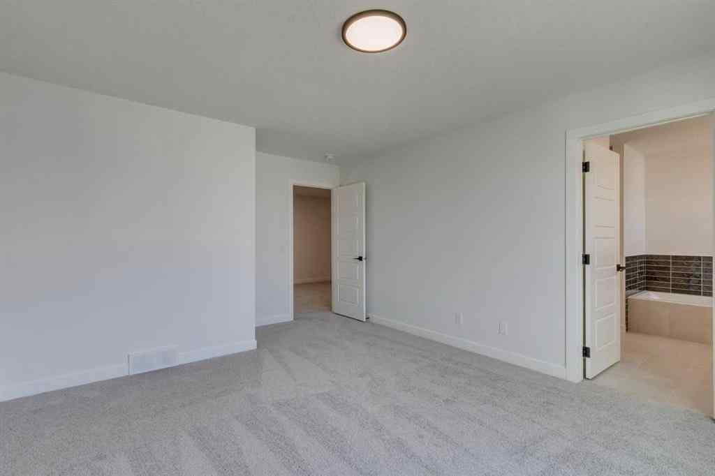 MLS® A2254589 - 104 Amblefield Grove NW in Moraine Calgary, Residential
