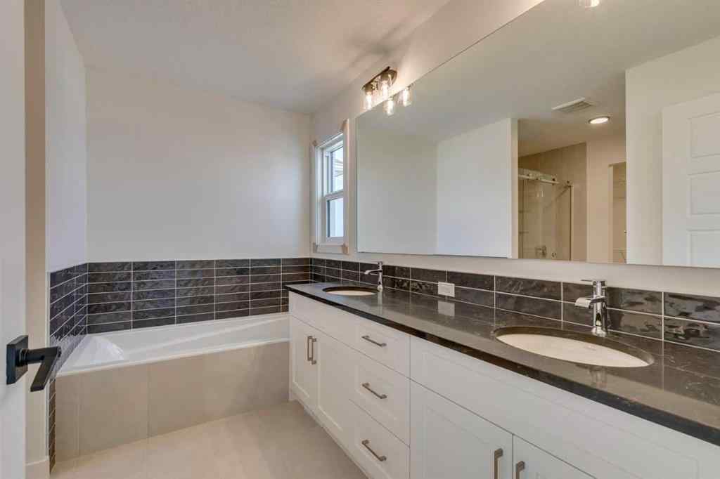 MLS® A2254589 - 104 Amblefield Grove NW in Moraine Calgary, Residential