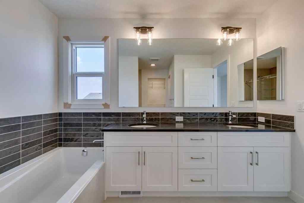 MLS® A2254589 - 104 Amblefield Grove NW in Moraine Calgary, Residential
