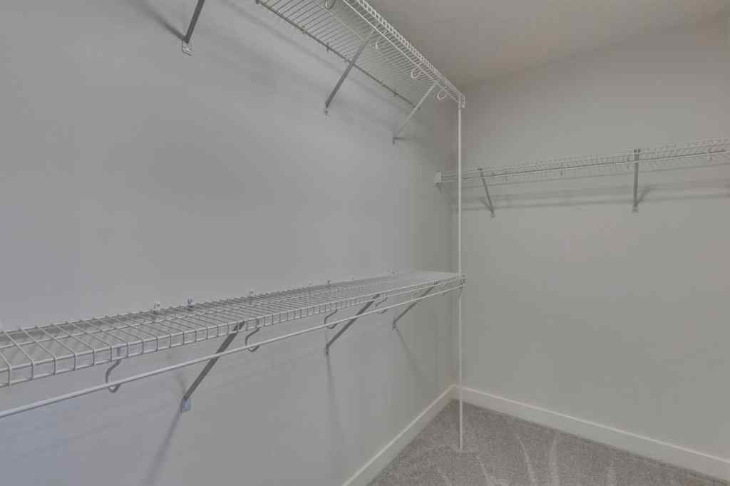 MLS® A2254589 - 104 Amblefield Grove NW in Moraine Calgary, Residential
