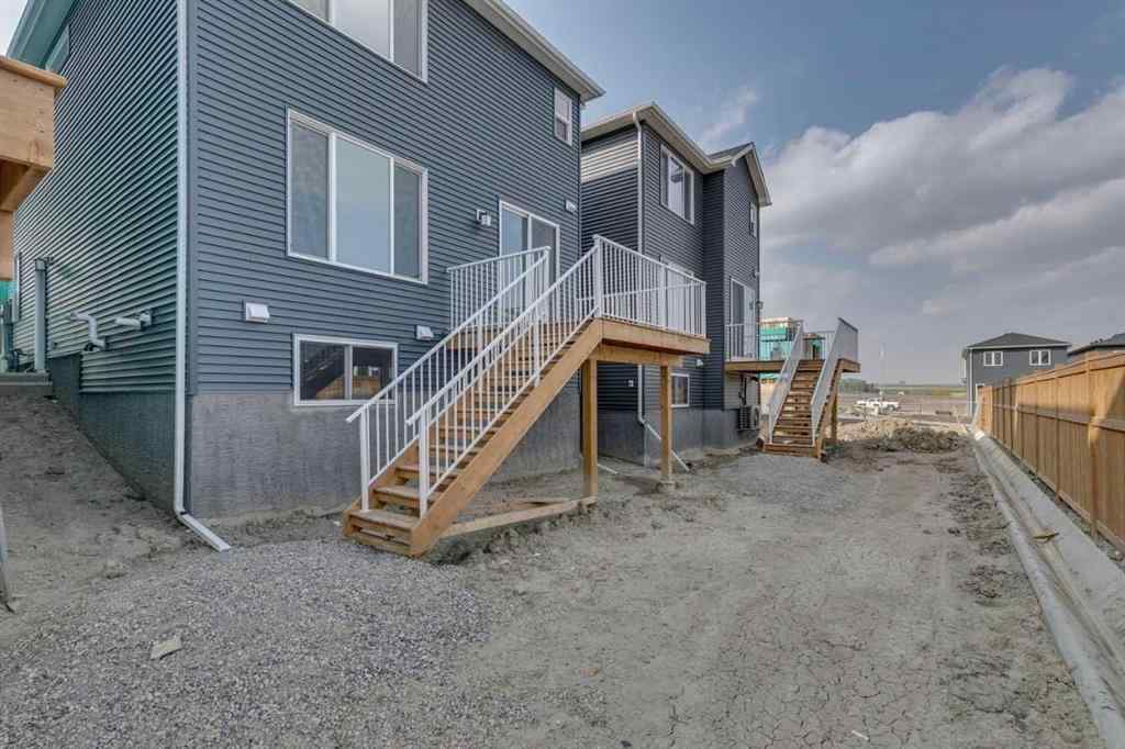 MLS® A2254589 - 104 Amblefield Grove NW in Moraine Calgary, Residential