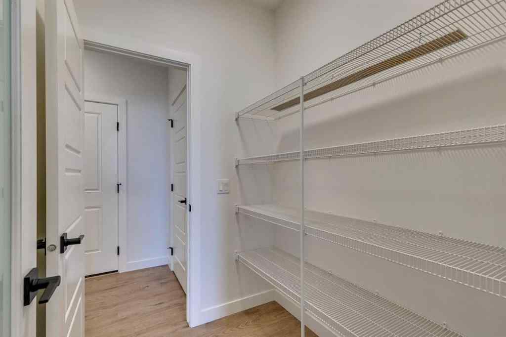 MLS® A2254589 - 104 Amblefield Grove NW in Moraine Calgary, Residential