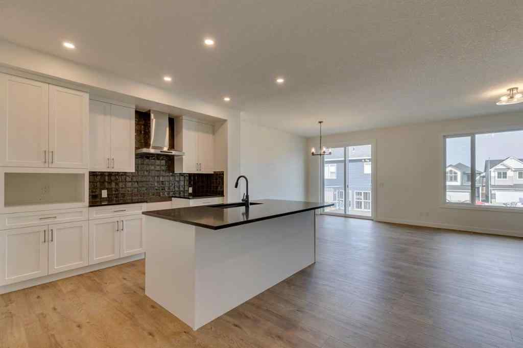 MLS® A2254589 - 104 Amblefield Grove NW in Moraine Calgary, Residential