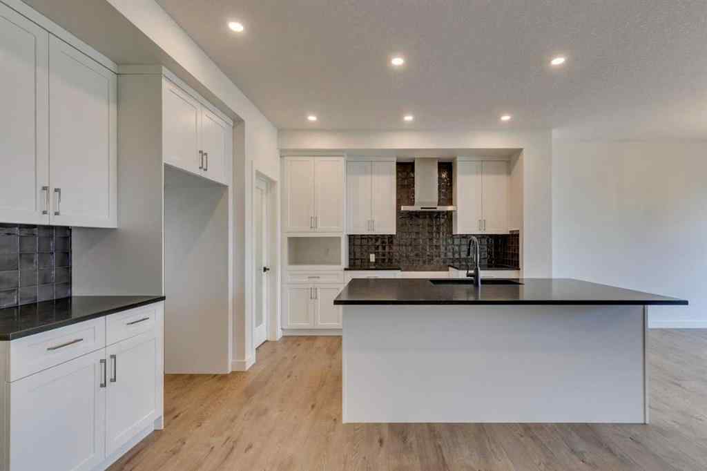 MLS® A2254589 - 104 Amblefield Grove NW in Moraine Calgary, Residential