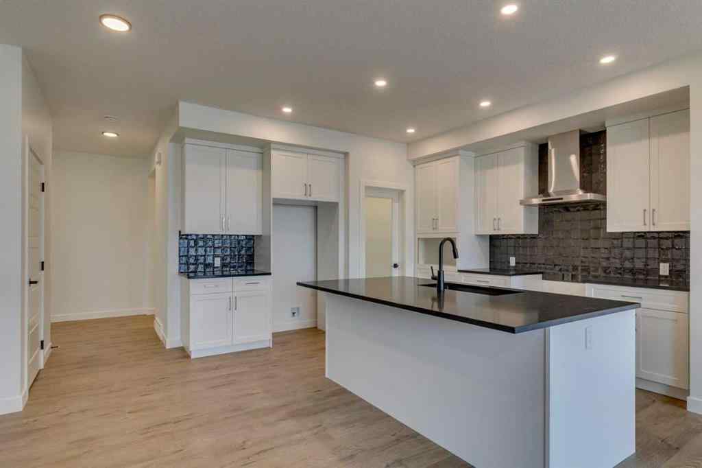 MLS® A2254589 - 104 Amblefield Grove NW in Moraine Calgary, Residential