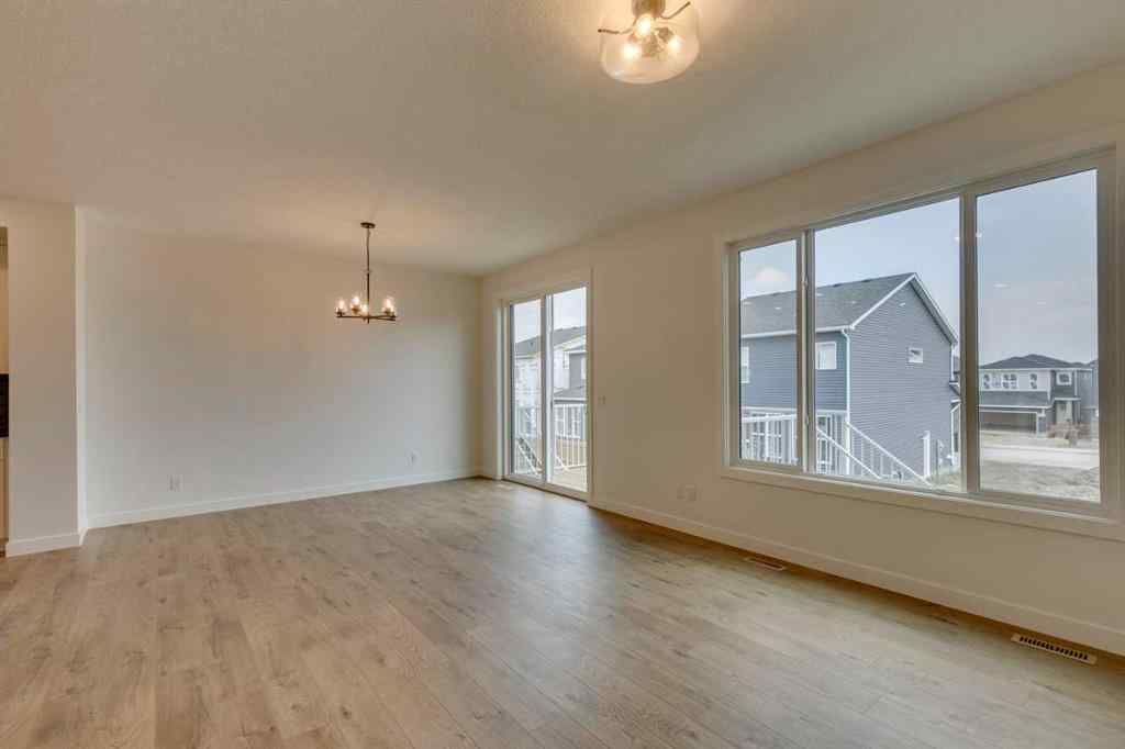 MLS® A2254589 - 104 Amblefield Grove NW in Moraine Calgary, Residential