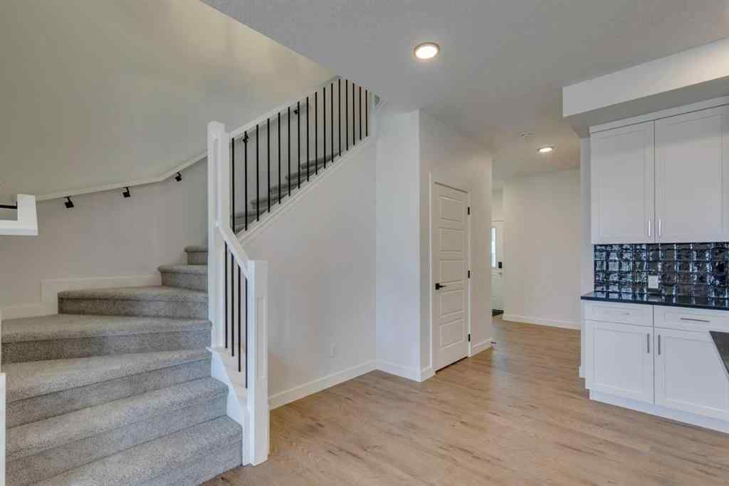 MLS® A2254589 - 104 Amblefield Grove NW in Moraine Calgary, Residential