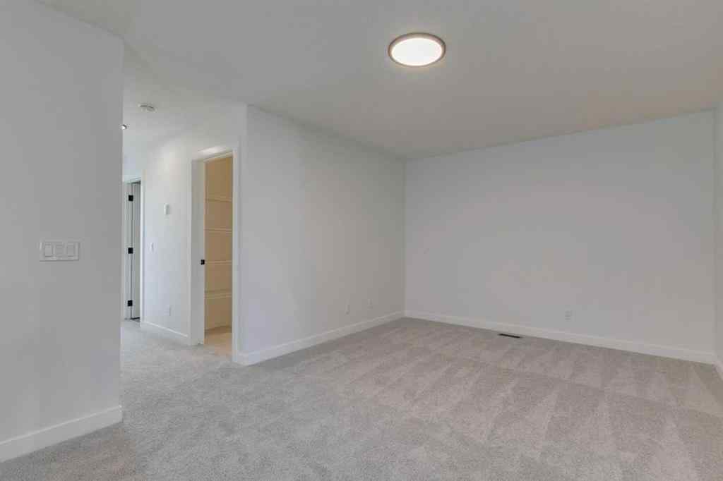 MLS® A2254589 - 104 Amblefield Grove NW in Moraine Calgary, Residential