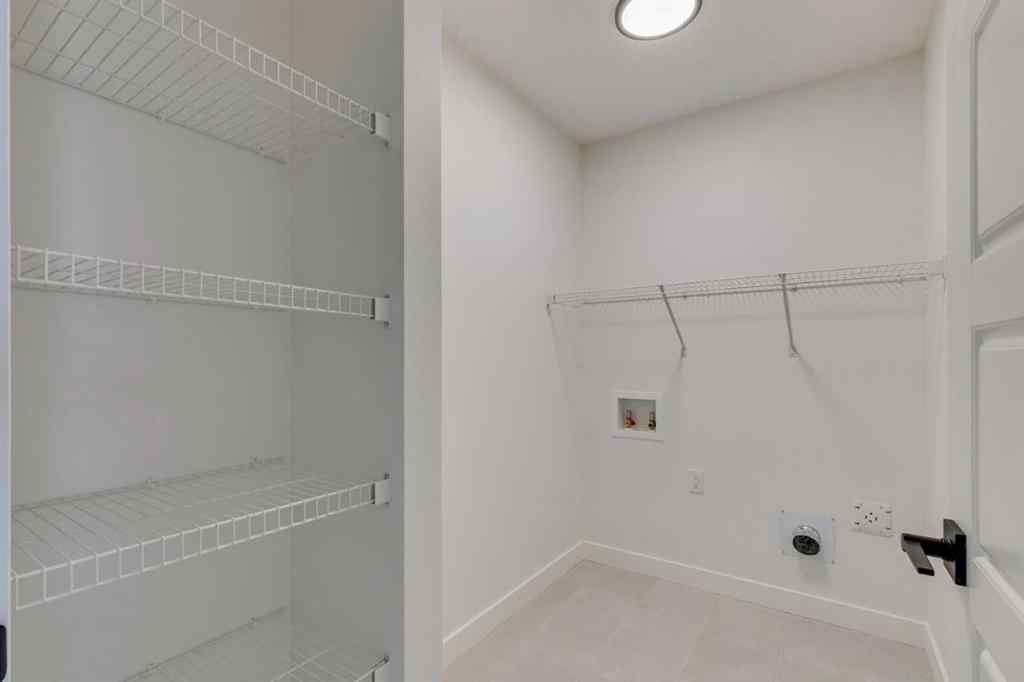 MLS® A2254589 - 104 Amblefield Grove NW in Moraine Calgary, Residential