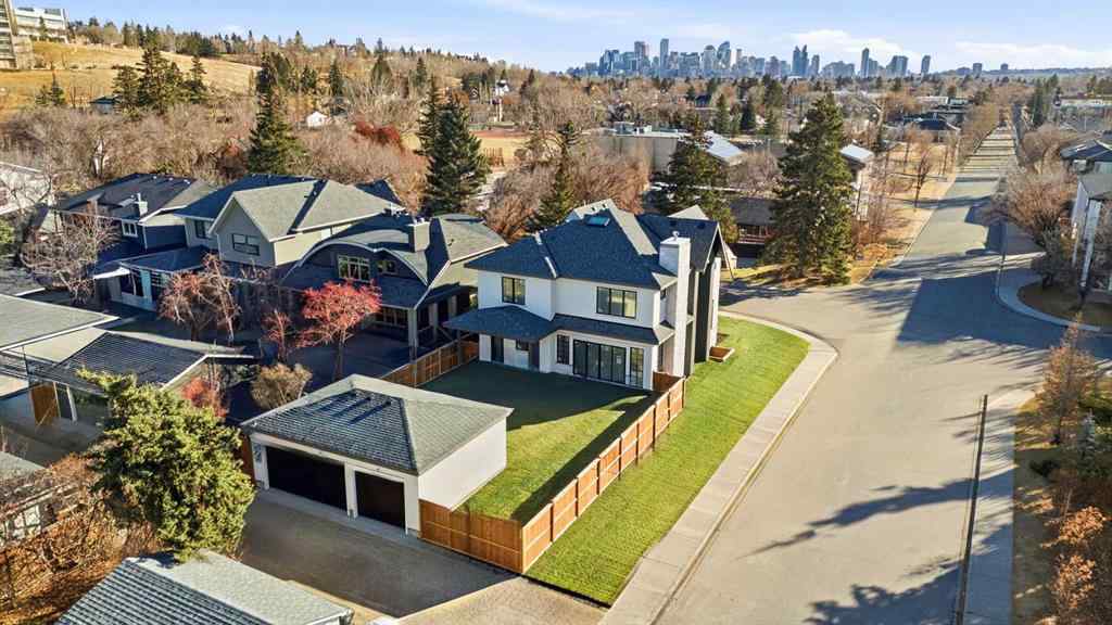 MLS&reg; # A2254598 - 703 35 Street NW in Parkdale Calgary, Residential Open Houses
