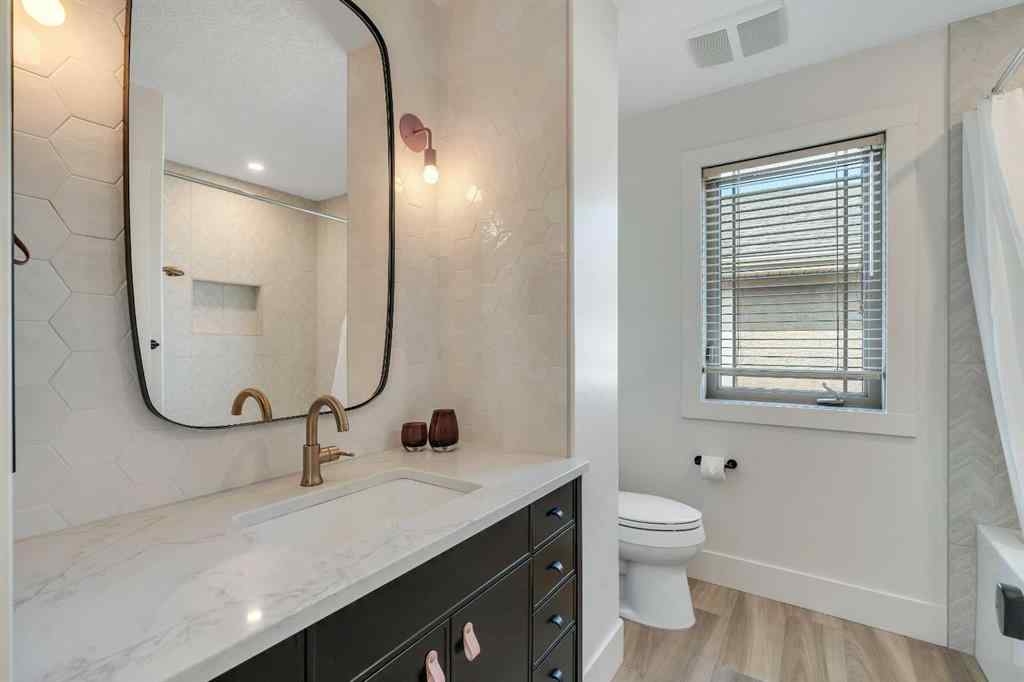 MLS® A2254616 - 5644 Henwood Street SW in Garrison Green Calgary, Residential
