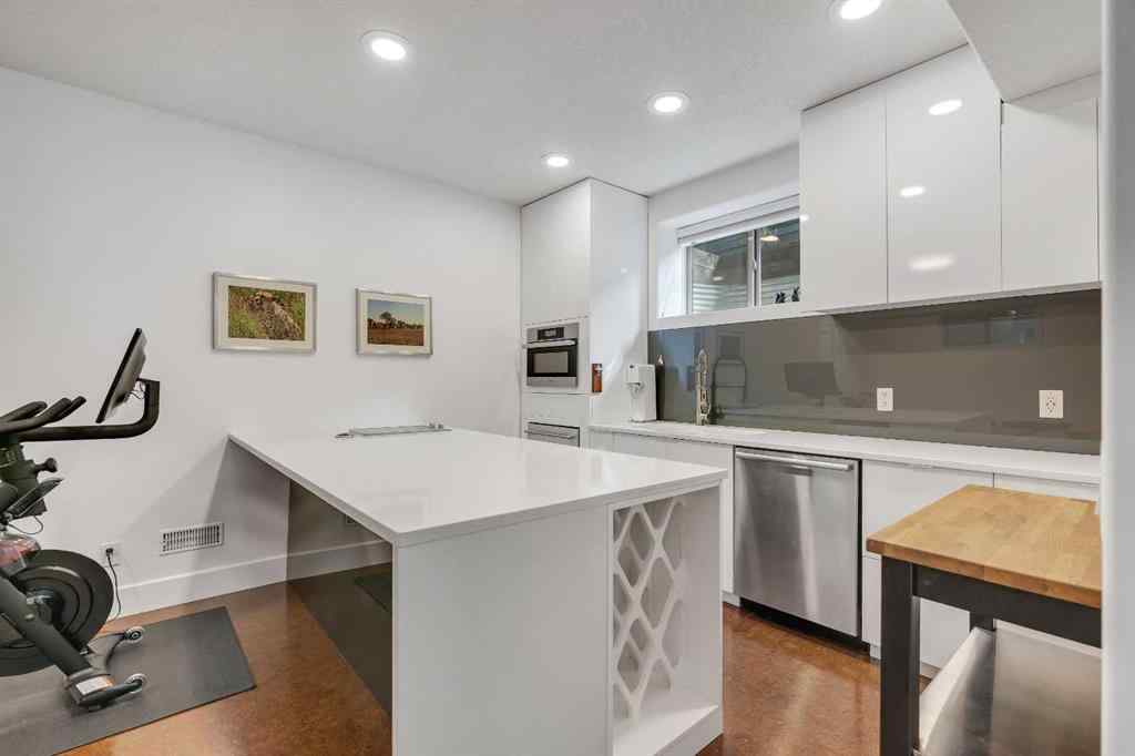 MLS® A2254616 - 5644 Henwood Street SW in Garrison Green Calgary, Residential