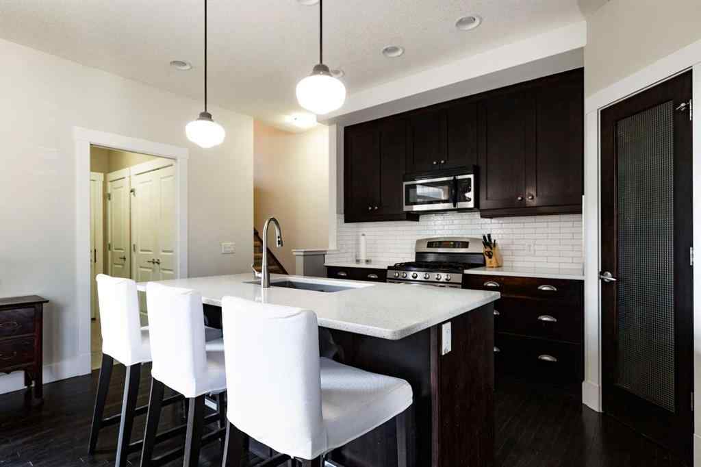 MLS® A2254640 - 152 Mike Ralph Way SW in Garrison Green Calgary, Residential