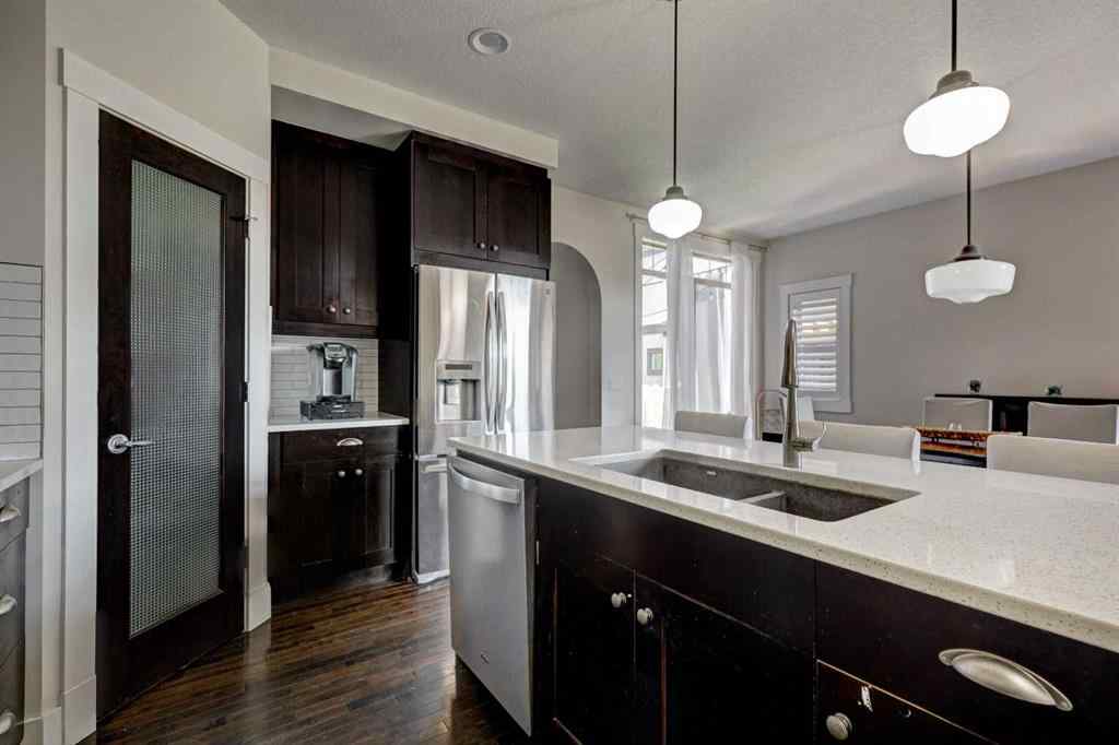 MLS® A2254640 - 152 Mike Ralph Way SW in Garrison Green Calgary, Residential