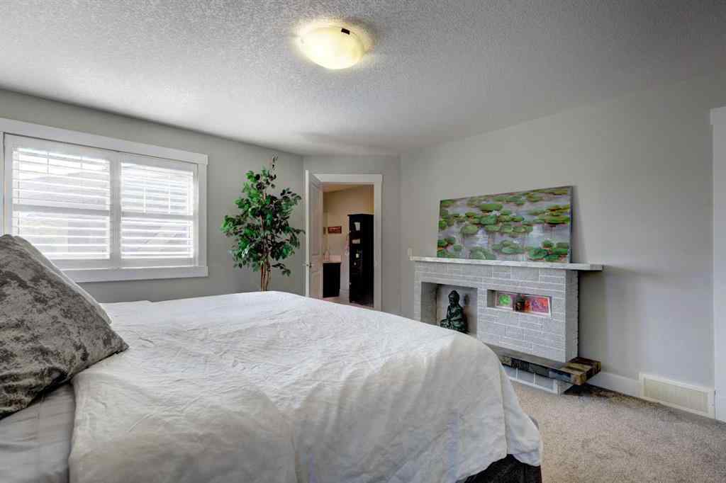 MLS® A2254640 - 152 Mike Ralph Way SW in Garrison Green Calgary, Residential