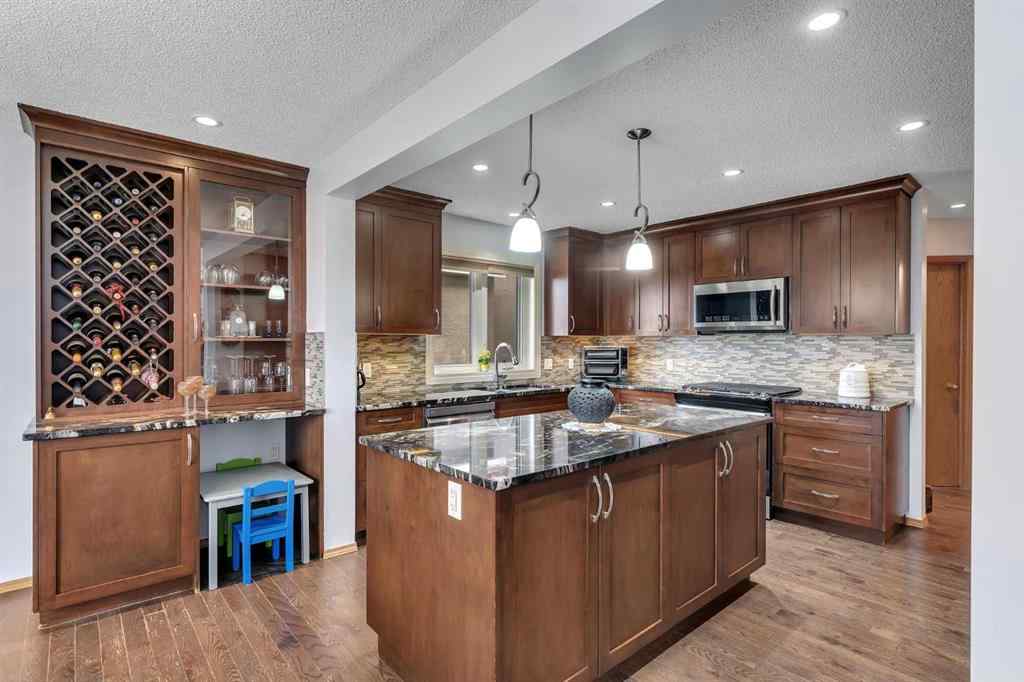 MLS® A2254641 - 228 Macewan Park View NW in MacEwan Glen Calgary, Residential