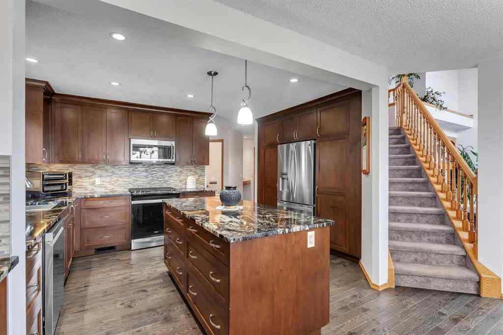 MLS® A2254641 - 228 Macewan Park View NW in MacEwan Glen Calgary, Residential