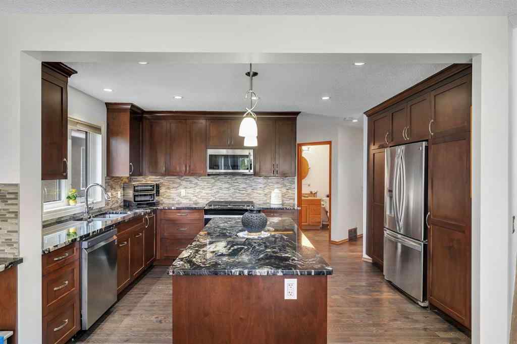 MLS® A2254641 - 228 Macewan Park View NW in MacEwan Glen Calgary, Residential